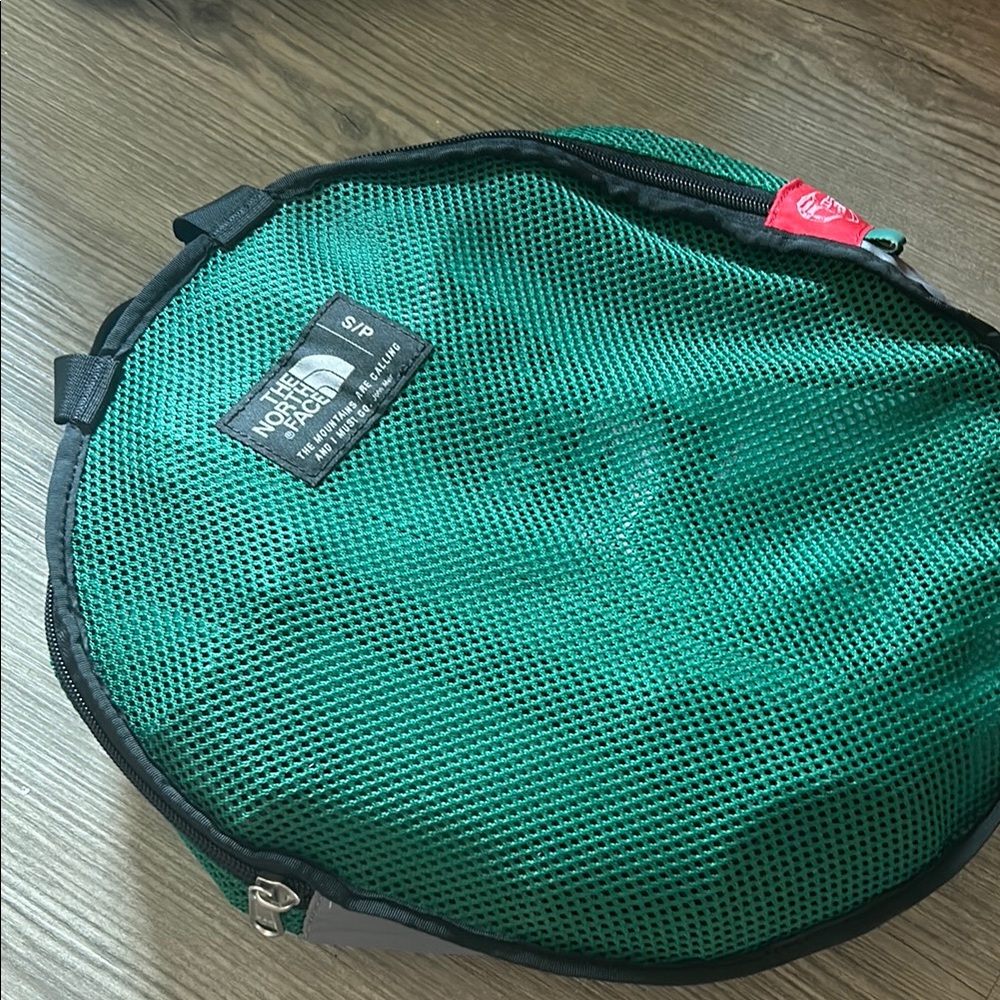 The North Face Green small Duffel Bag
